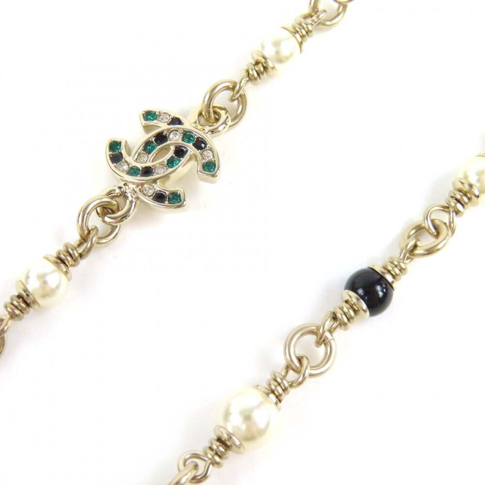 CHANEL Gold Pearl Logo Necklace - Picture 6 of 8